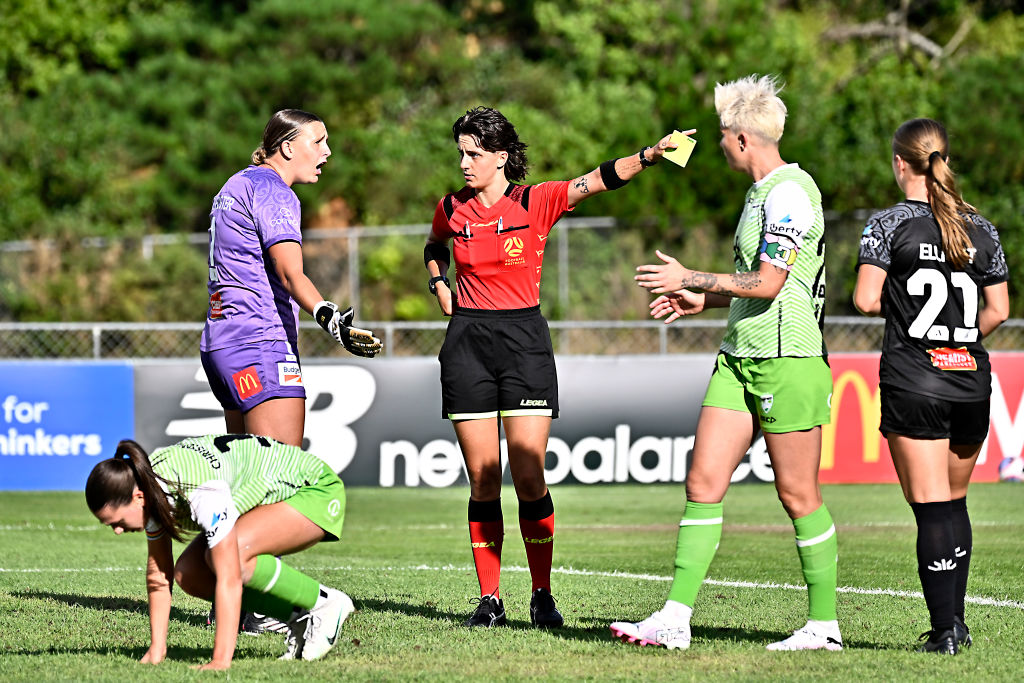 Referee Molly Godsell shows a red card to Rylee Foster (GK) of the Phoenix during the A-League Women round 14 match between Wellington Phoenix and Canberra United at Porirua Park, on January 28, 2024, in Wellington, New Zealand. (Photo by Masanori Udagawa/Getty Images)