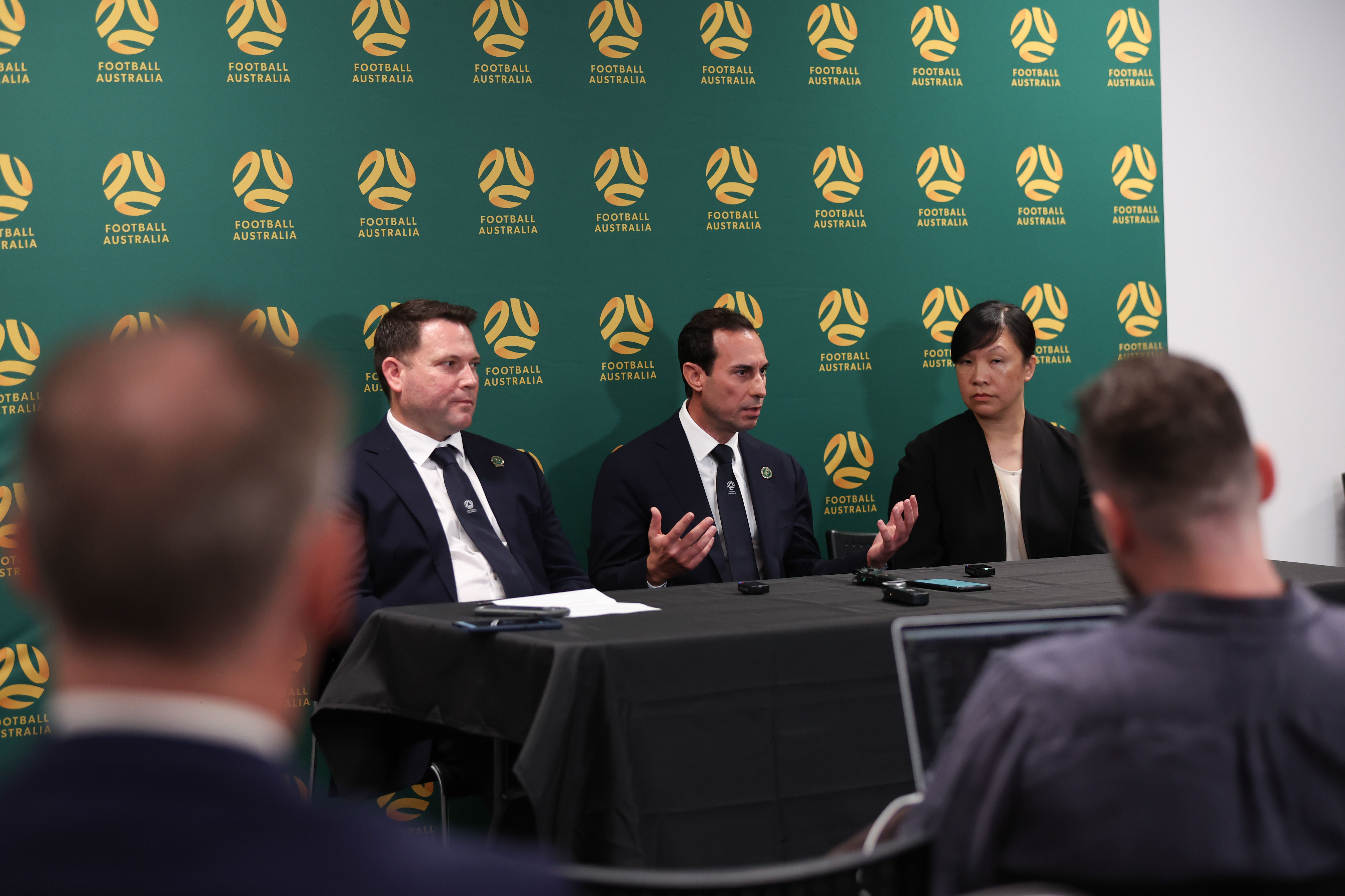 Jaclyn Lee-Joe (R) with Football Australia's CEO James Johnson (L) & Football Australia Chair Anter Isaac (middle)